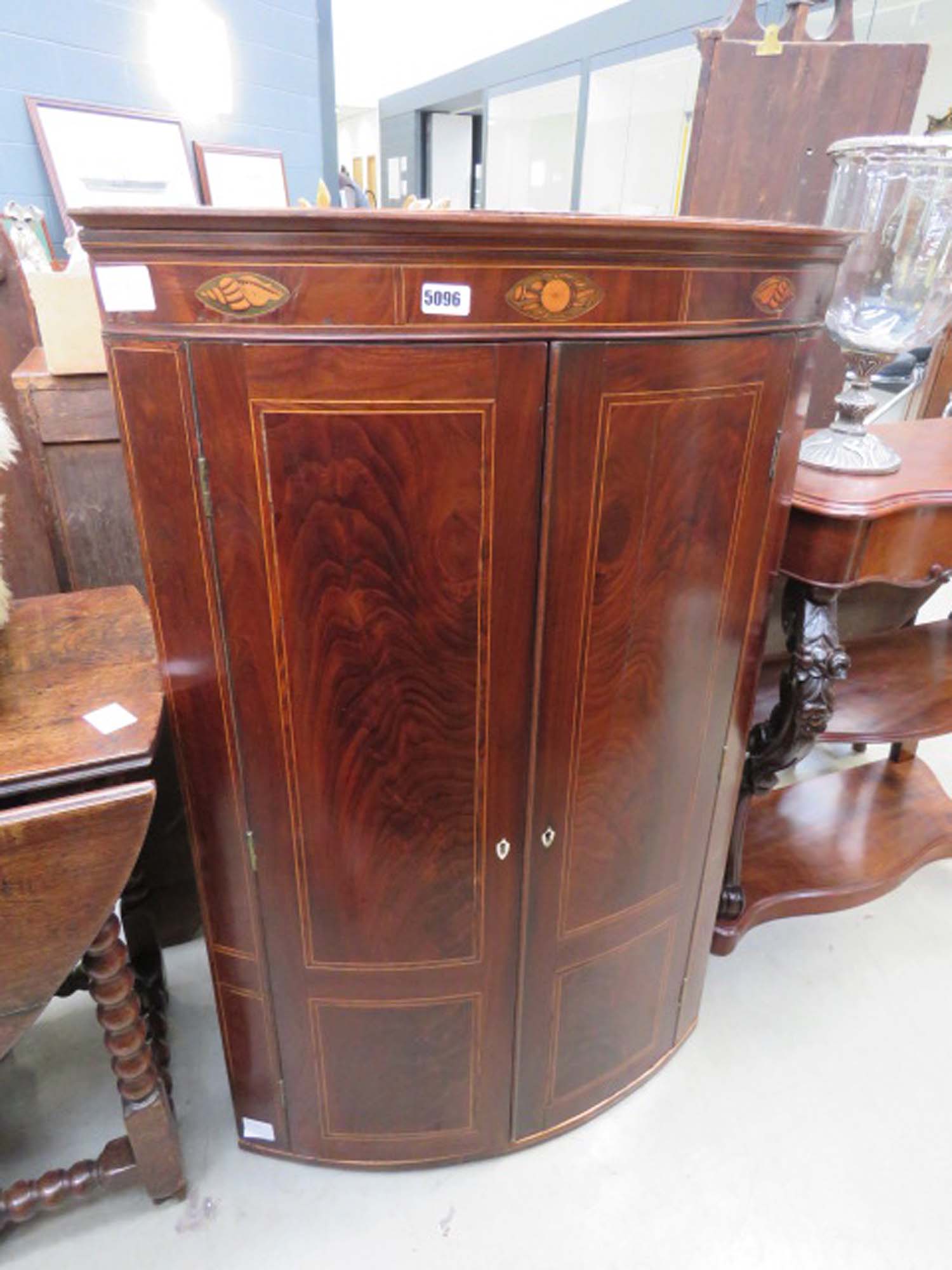 Georgian mahogany double door bow fronted corner unit