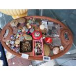 Carved wooden tray plus a qty of badges and pill boxes