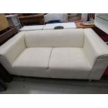 Cream leather effect 2 seater sofa