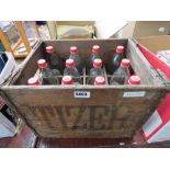 Wooden box containing Tizer bottles