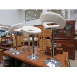 4 cream leather effect and chrome swivel bar stools