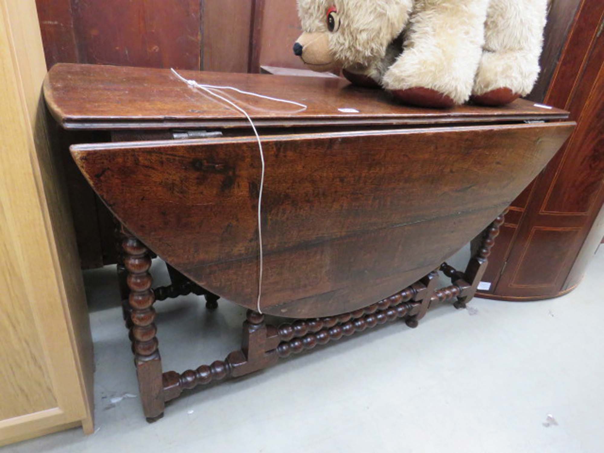 Georgian oak drop side table with bobbin turned supports