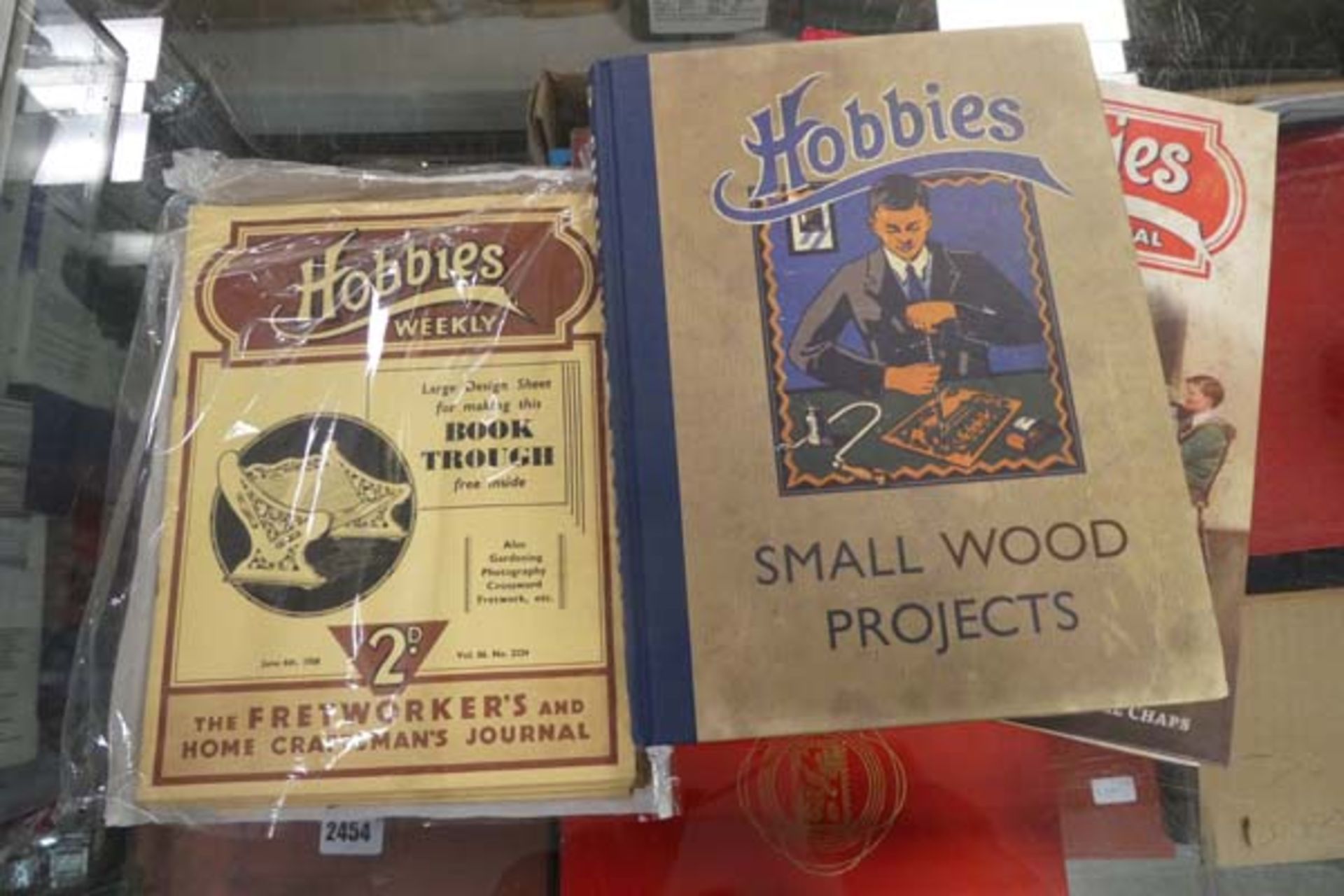 (8) Plastic tray containing a Hobbies annual - Hobbies small wood project book