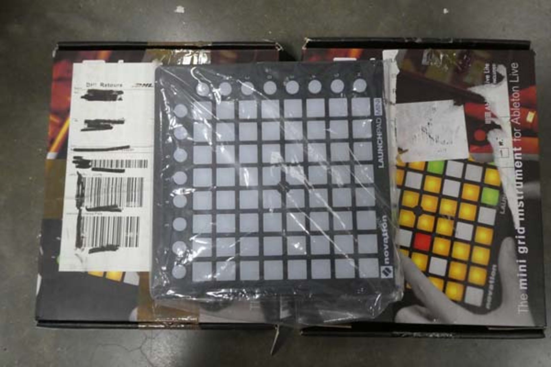 Two Novation Launchpad Mini USB kits in boxes