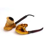 A meerschaum pipe modelled as a bearded figure,