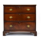 An early 19th century mahogany, crossbanded and strung chest of three drawers on bracket feet, w.