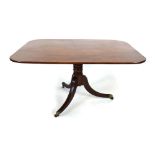 A 19th century mahogany tilt-top table,