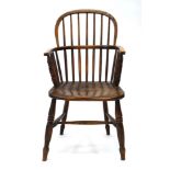 An 18th century elm seated spindle back Windsor armchair