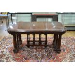 A Victorian mahogany extending dining table, 123 to 243 cm, with three fitted leaves,