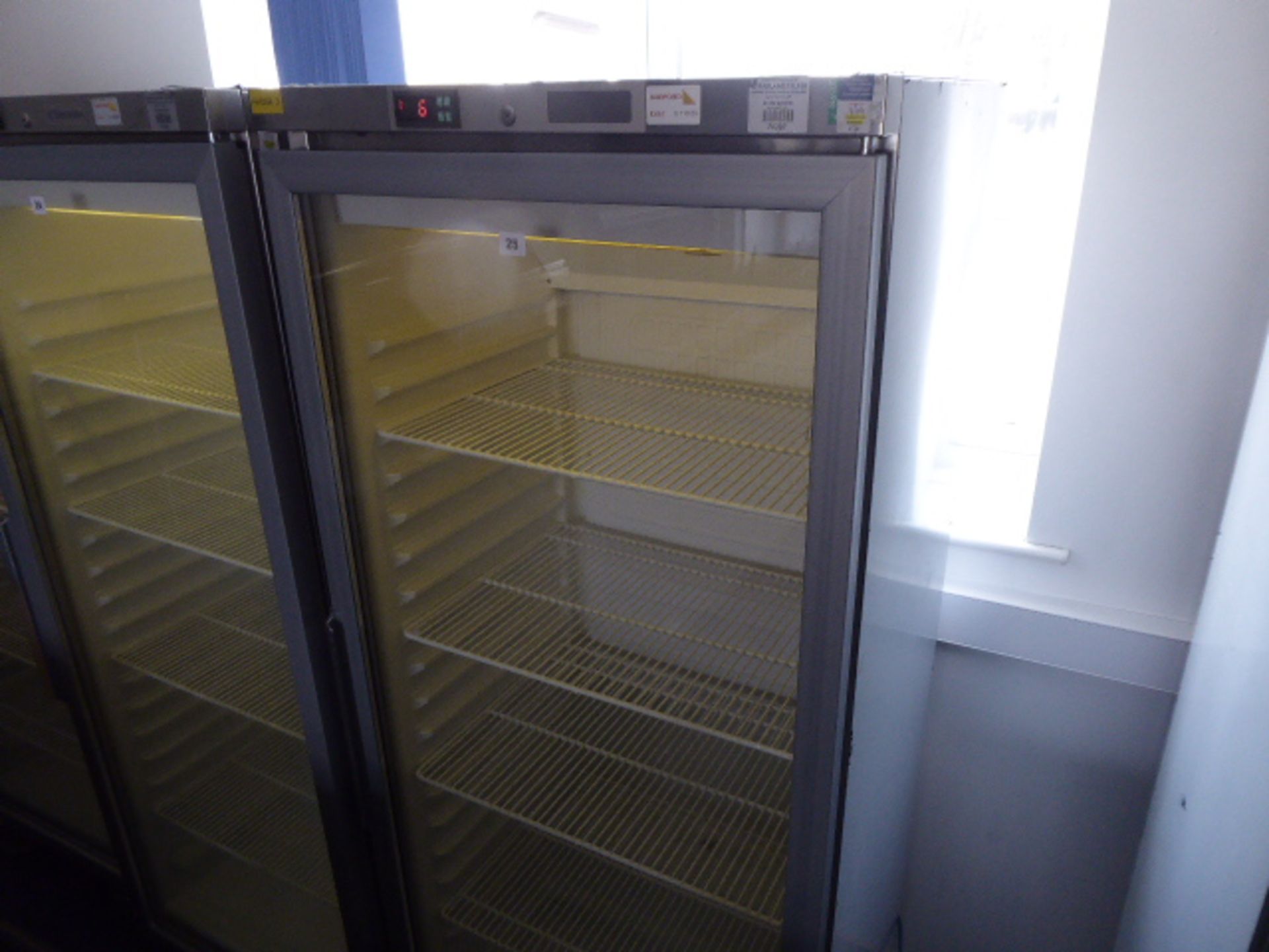 70cm Electrolux glass fronted display fridge on castors