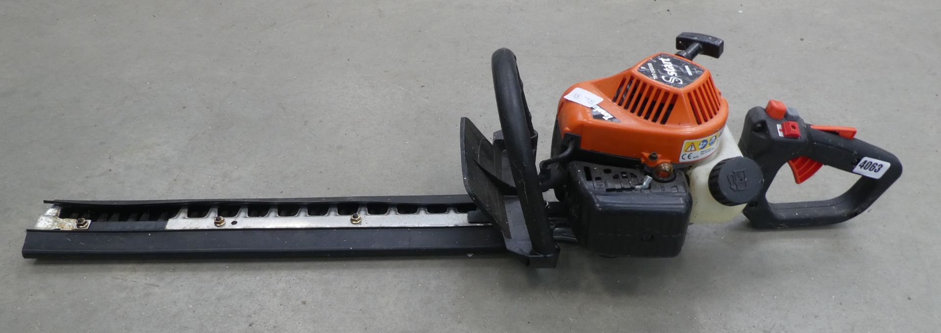 Tanaka orange petrol powered hedge cutter