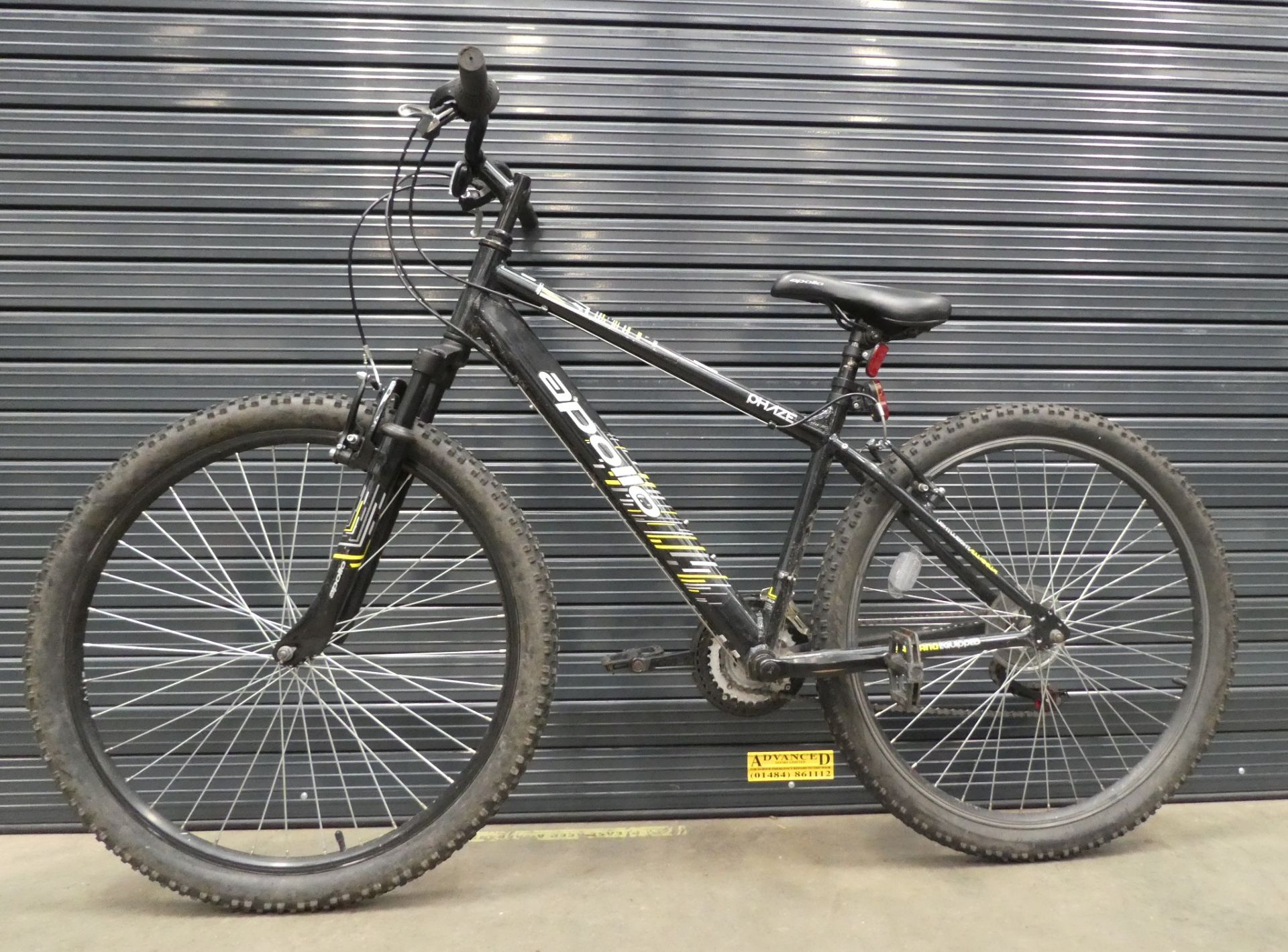 Apollo black and yellow mountain bike