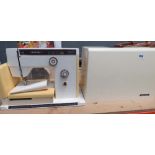 Cased Riccar sewing machine