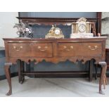 (2119RR) 10 - An 18th century oak dresser, the three-tier plate rack over two drawers and a shaped