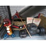 Cage with gas mask, military belts, Union Jack flag, jigsaw puzzles and carnival glass clown