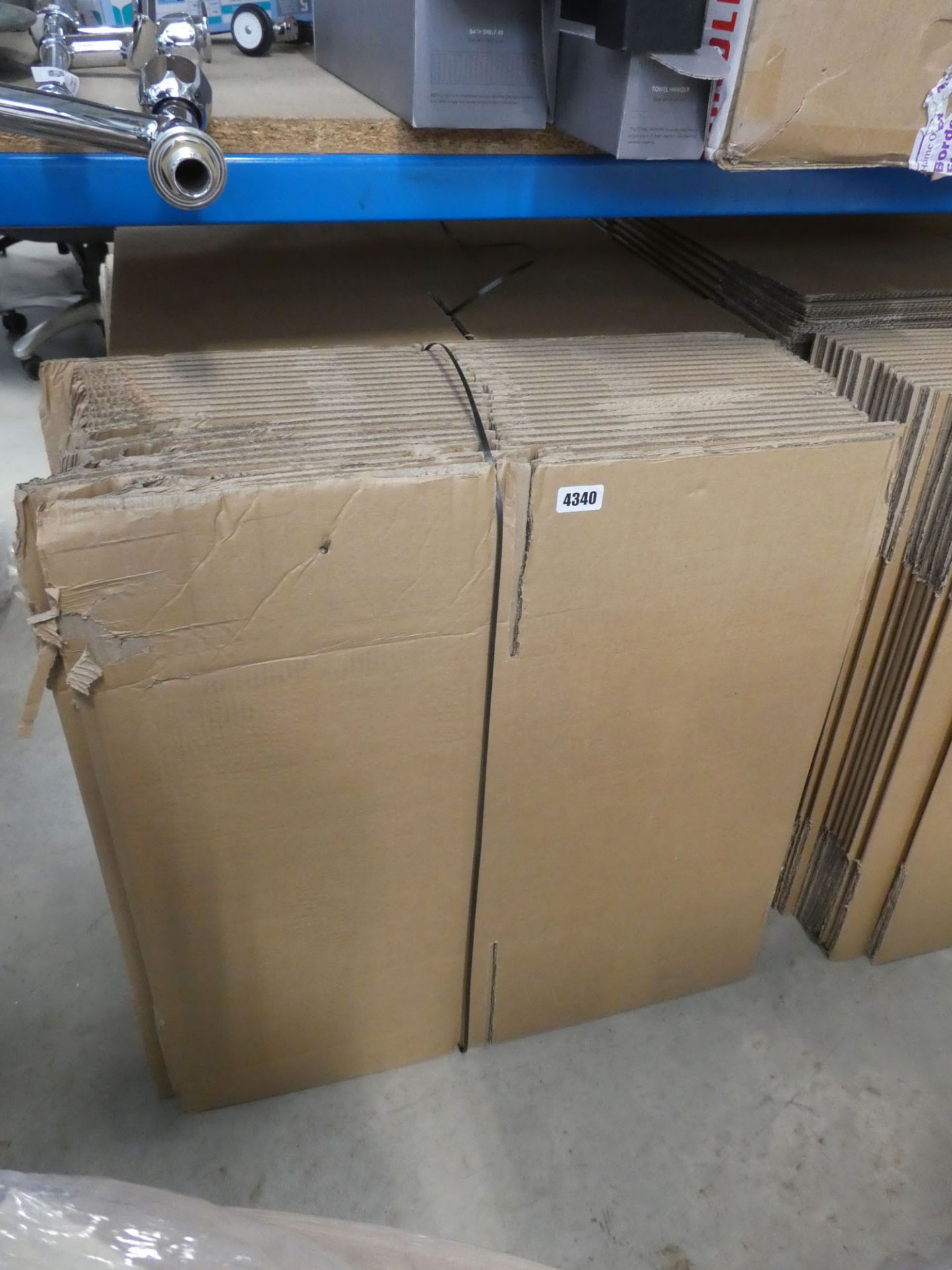 Five bundles of cardboard boxes