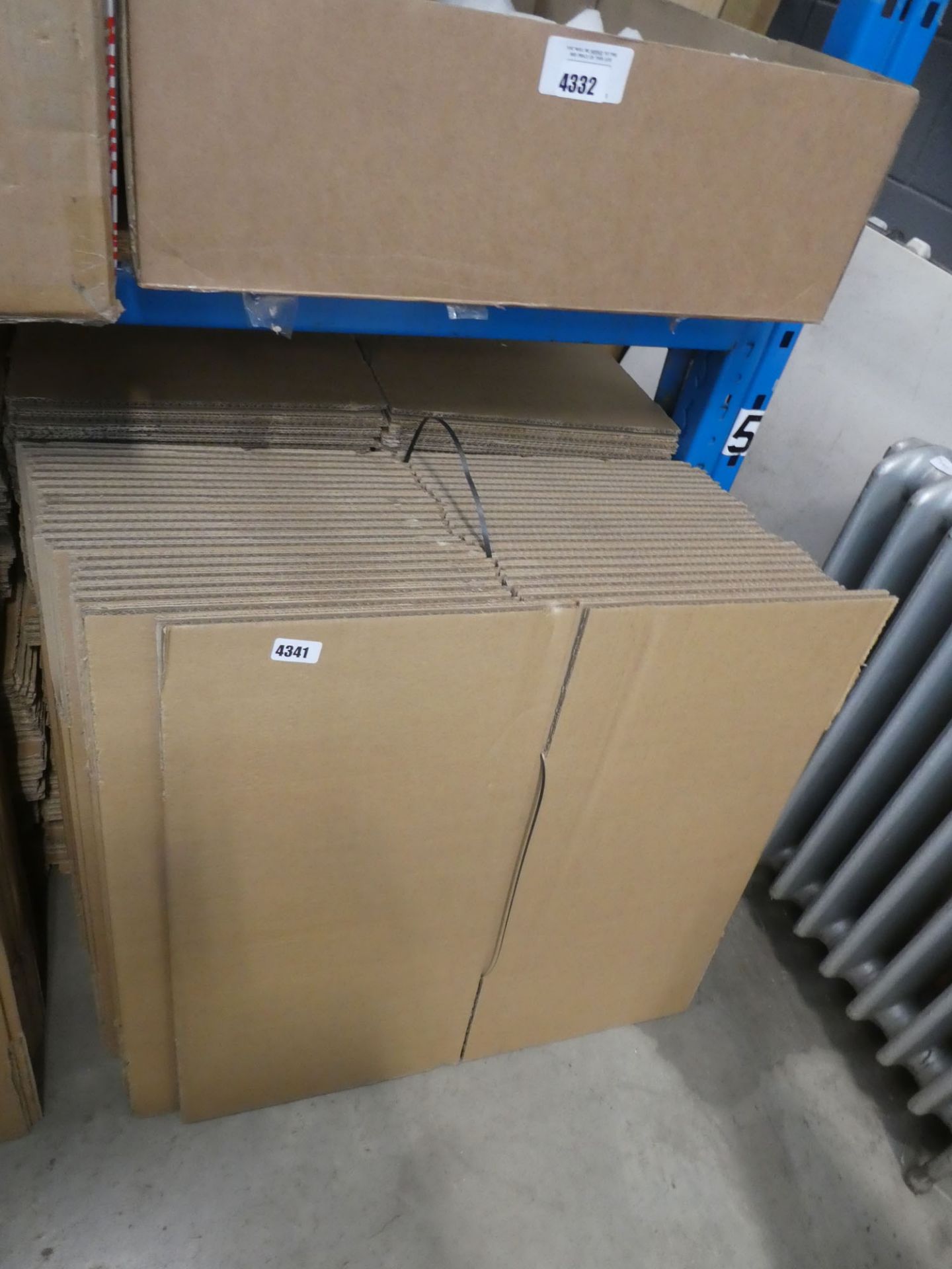 Five bundles of cardboard boxes