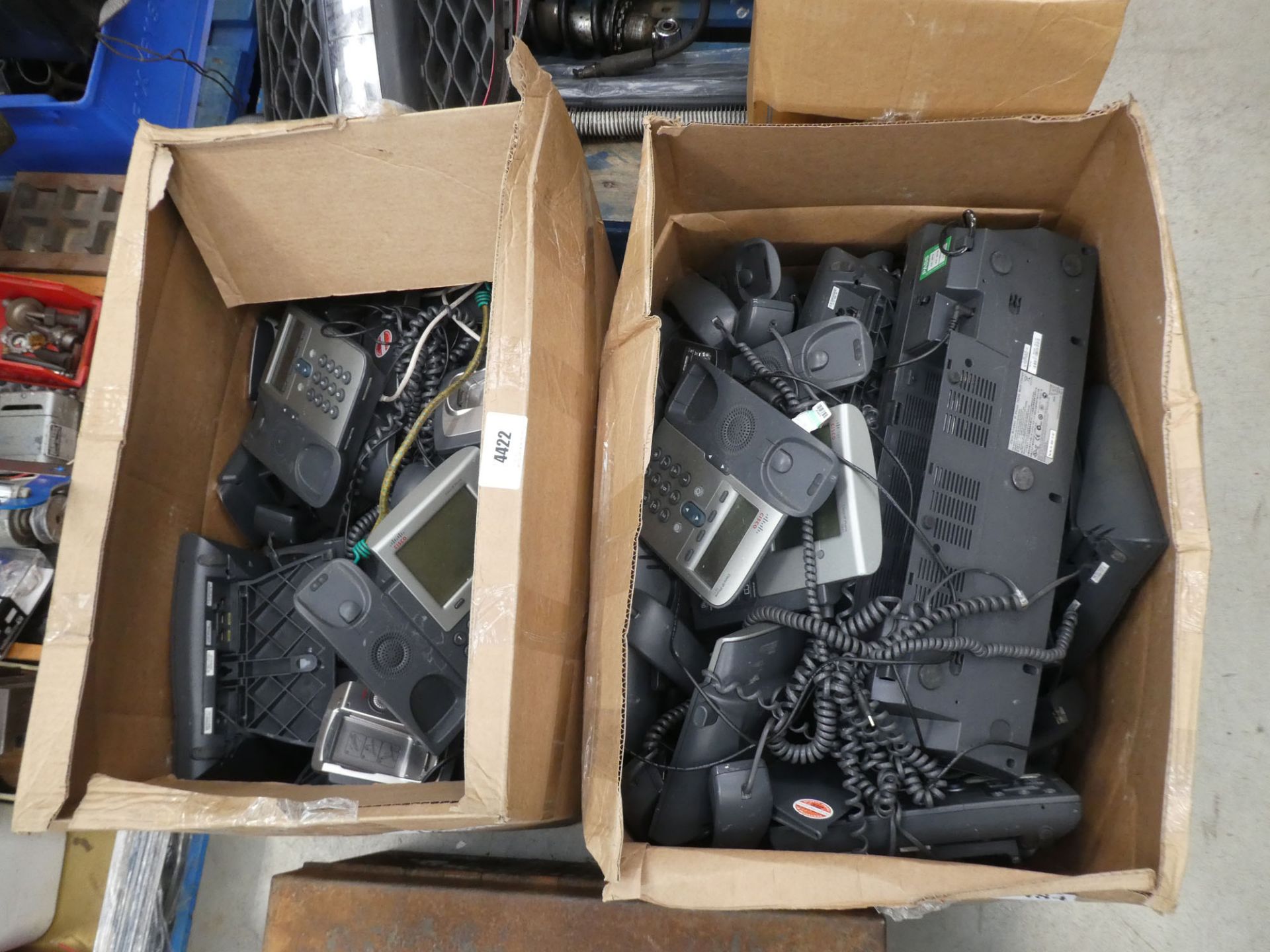 Two boxes of office phones