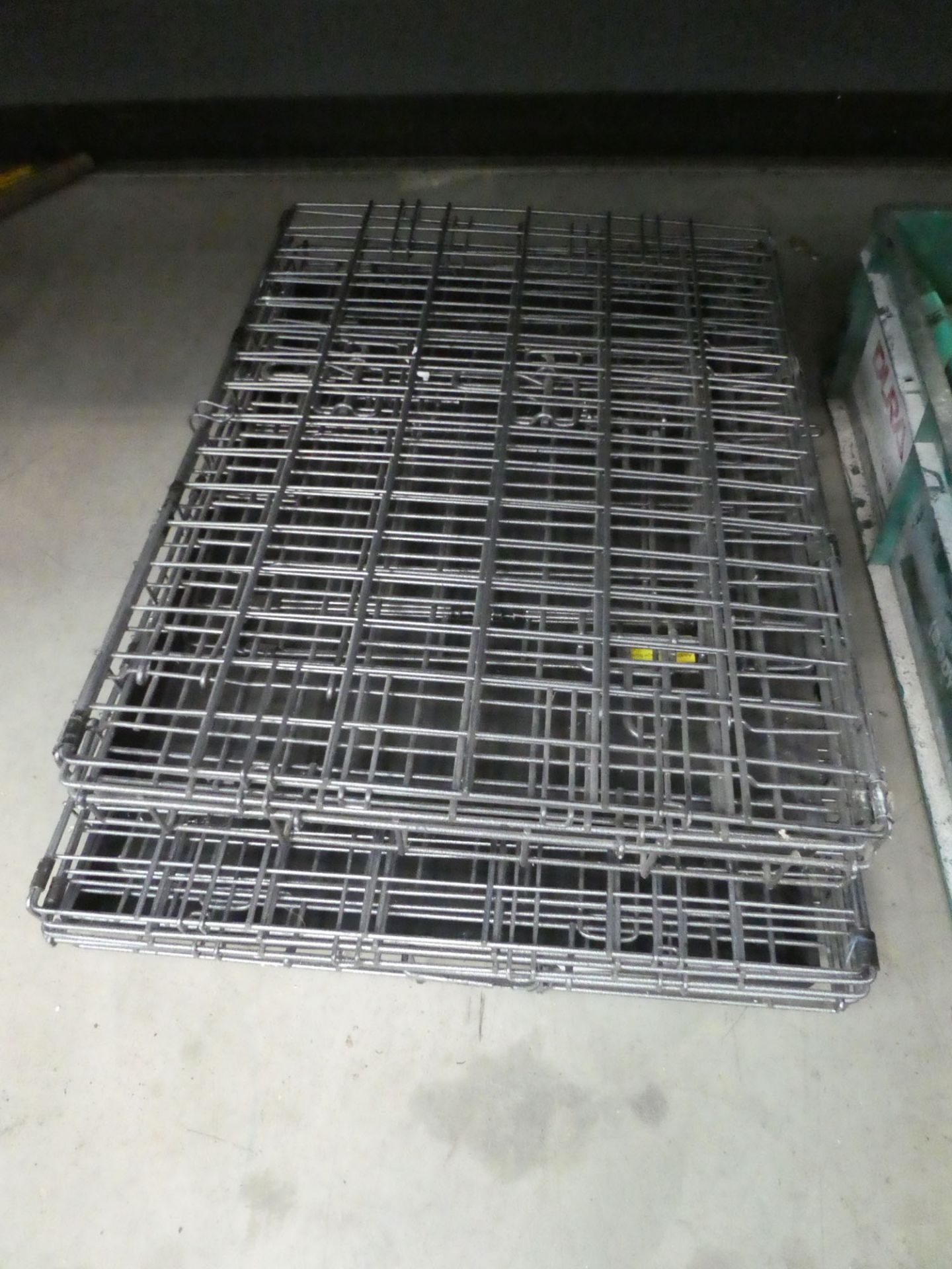 Two folding pet cages