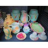 Cage with 1930's floral vases plus a qty of pottery jugs, bowls and candlesticks