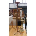 Wrought iron candlestick, a metal stand and a brass finish table lamp