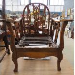 1930's carved oak armchair with folding back