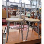 Pair of metal dining chairs with beech seats