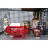 Cage with a carnival glass clown, red glass fruit bowl, coffee pots and a barometer