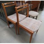 Pair of teak dining chairs