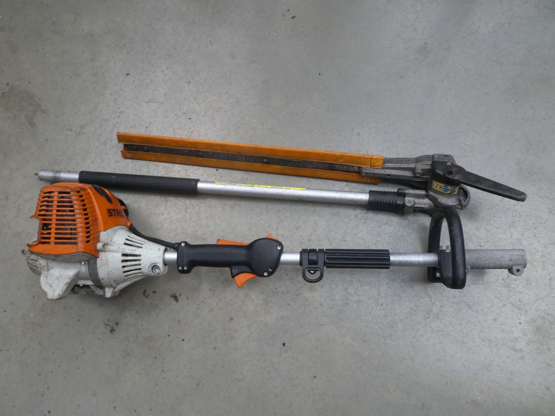 Stihl KM90R petrol powered multi tool with hedgecutter attachment