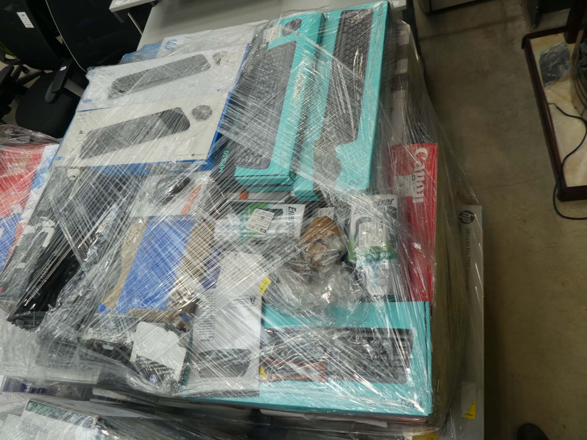 Pallet of assorted items including pressure washers, printers, keyboards, etc