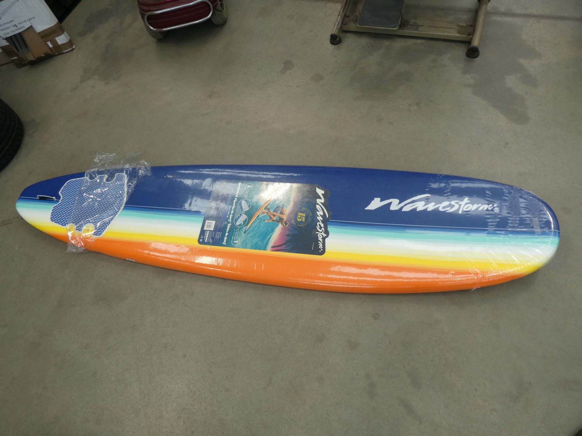 Orange and yellow surfboard