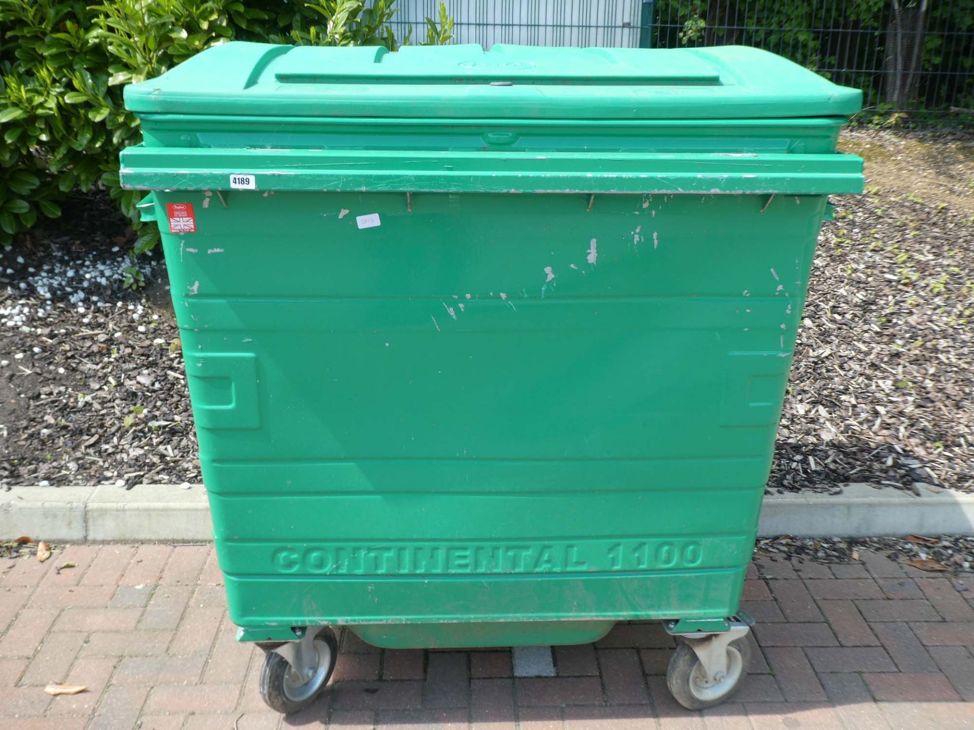 Large green heavy duty waste bin