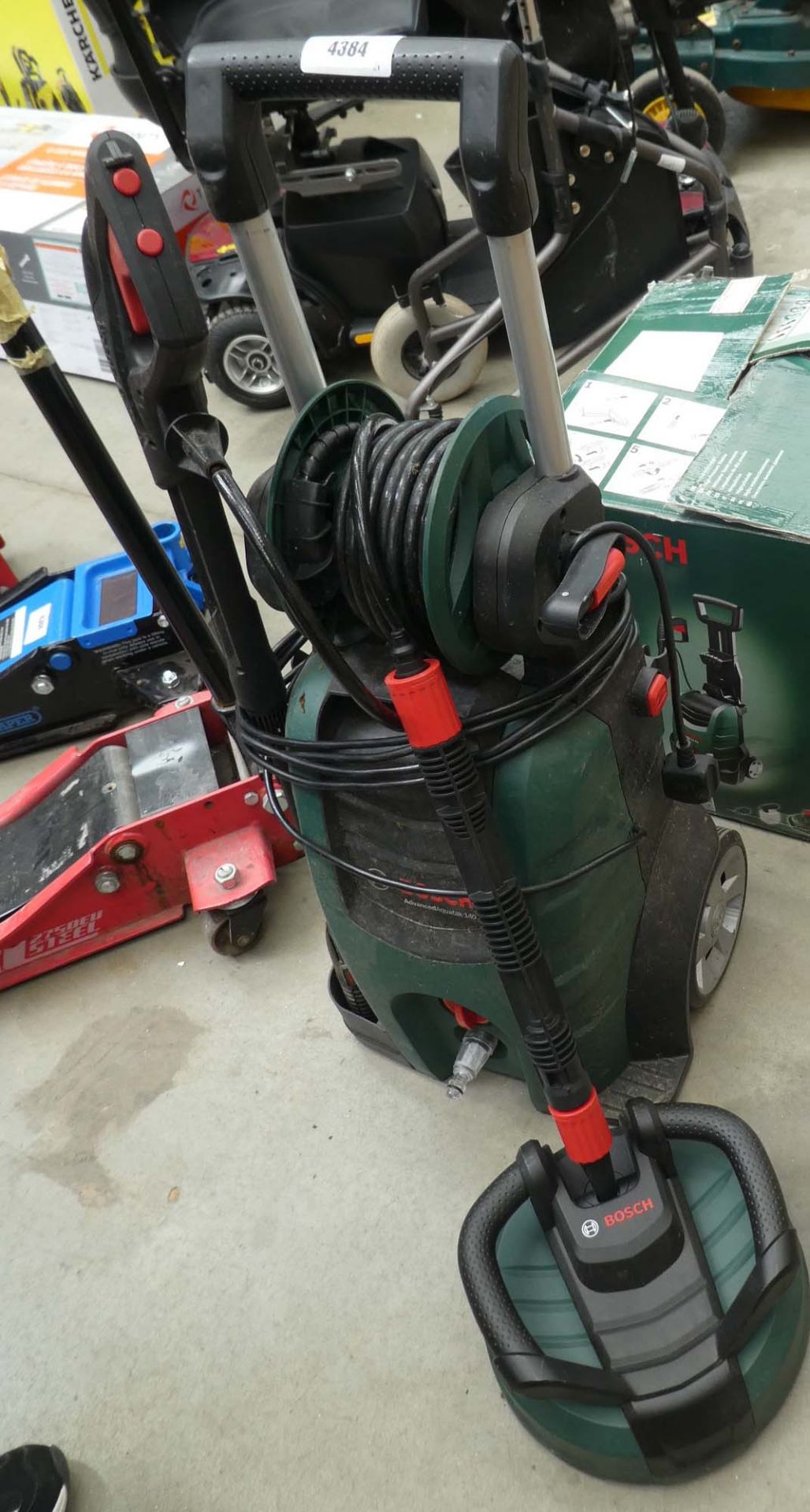 Bosch Advance Aquatack electric pressure washer with patio cleaning head