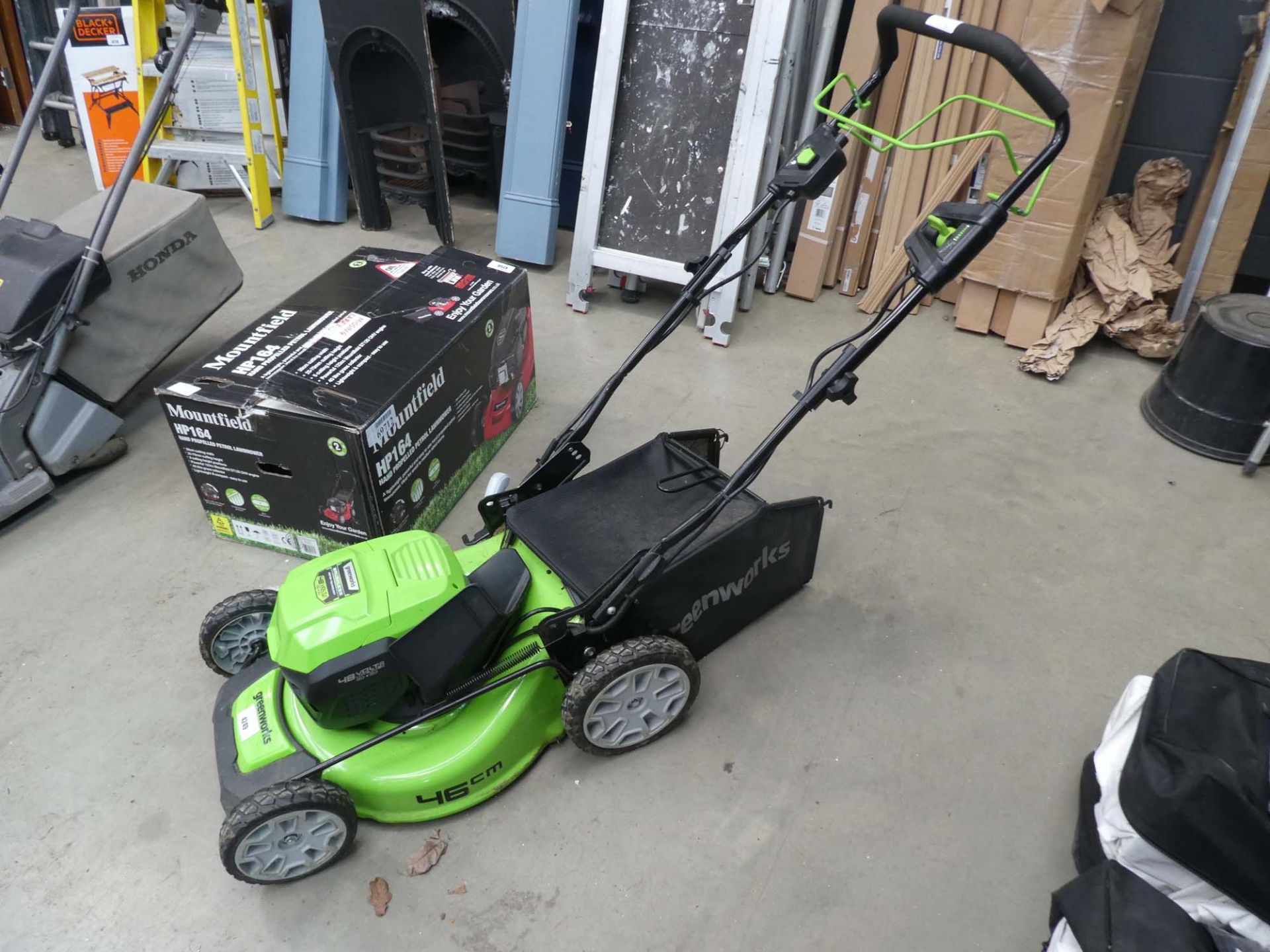 Greenworks battery powered mower with 2x batteries and charger