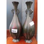 2 bronze vases of organic form
