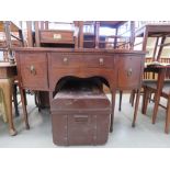 Georgian sideboard with central drawer flanked by 2 cupboards with lion decorated handles