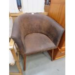 De-stressed leather effect tub chair on turn support