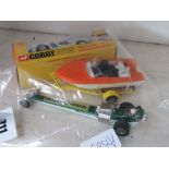 5711 - Bag containing a Corgi car plus a dragster and a plastic motorboat