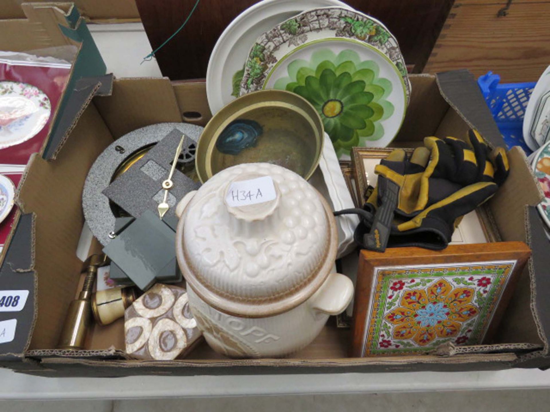 Box containing biscuit barrel, brass pot, Quartz wall clock, brass trays, corkscrew, general china