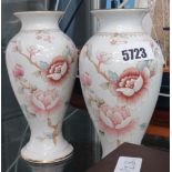 2 floral decorated vases