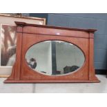 Inlaid oval over mantle mirror