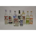 9 bottles, 4 of Smirnoff Vodka, 1x 75cl 37.5%, 1x 70cl 37.5%, 1x 13 1/3 fl oz 65.