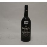 A bottle of Dow's 1977 Vintage Port (ullage into neck)