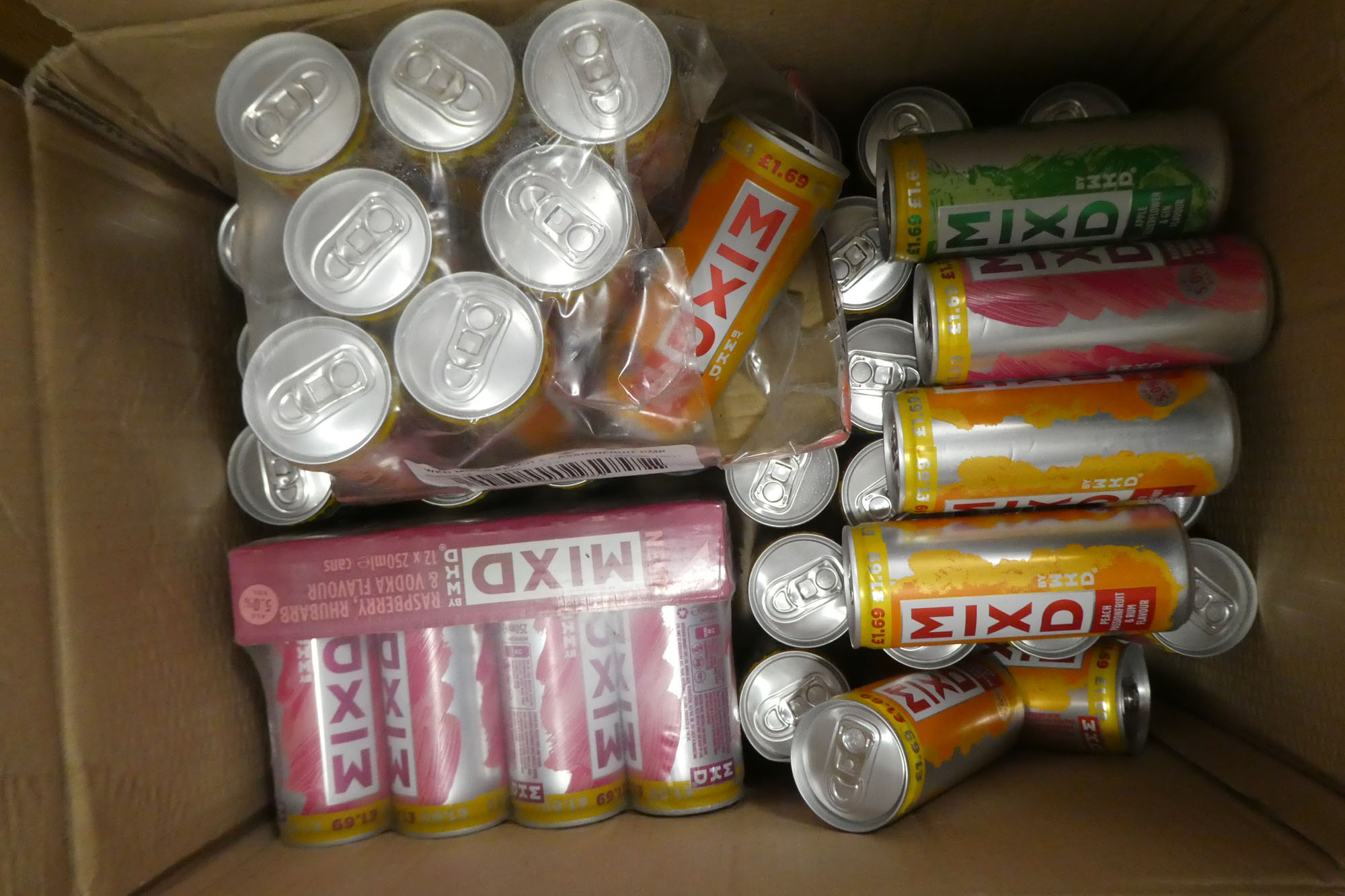 About 55 cans of WKD MIXD Peach/Passionfruit/Rum,