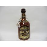 A bottle of Chivas Regal 12 year old Blended Whisky circa mid 1970's, 26 2/3 fl oz / 75.