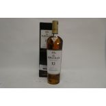 A bottle of The MACALLAN 12 year old Sherry Oak Cask Highland Single Malt Scotch Whisky with box