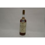 A bottle of The MACALLAN 12 year old Single Highland Malt Scotch Whisky matured in Sherry wood,