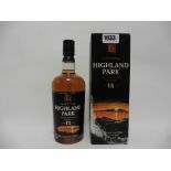 An old bottle of Highland Park 12 year old Single Malt Scotch Whisky from the Orkney Islands with