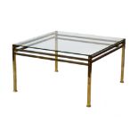 A 1970's brass finished occasional table with a square glass surface, w.